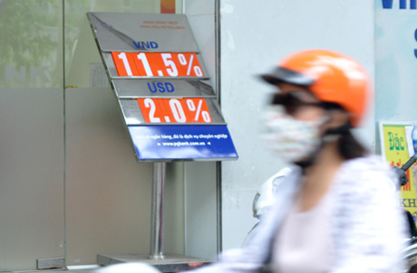 Lãi suất huy động có thể về 8% một năm trong tuần này. Ảnh: Anh Quân.